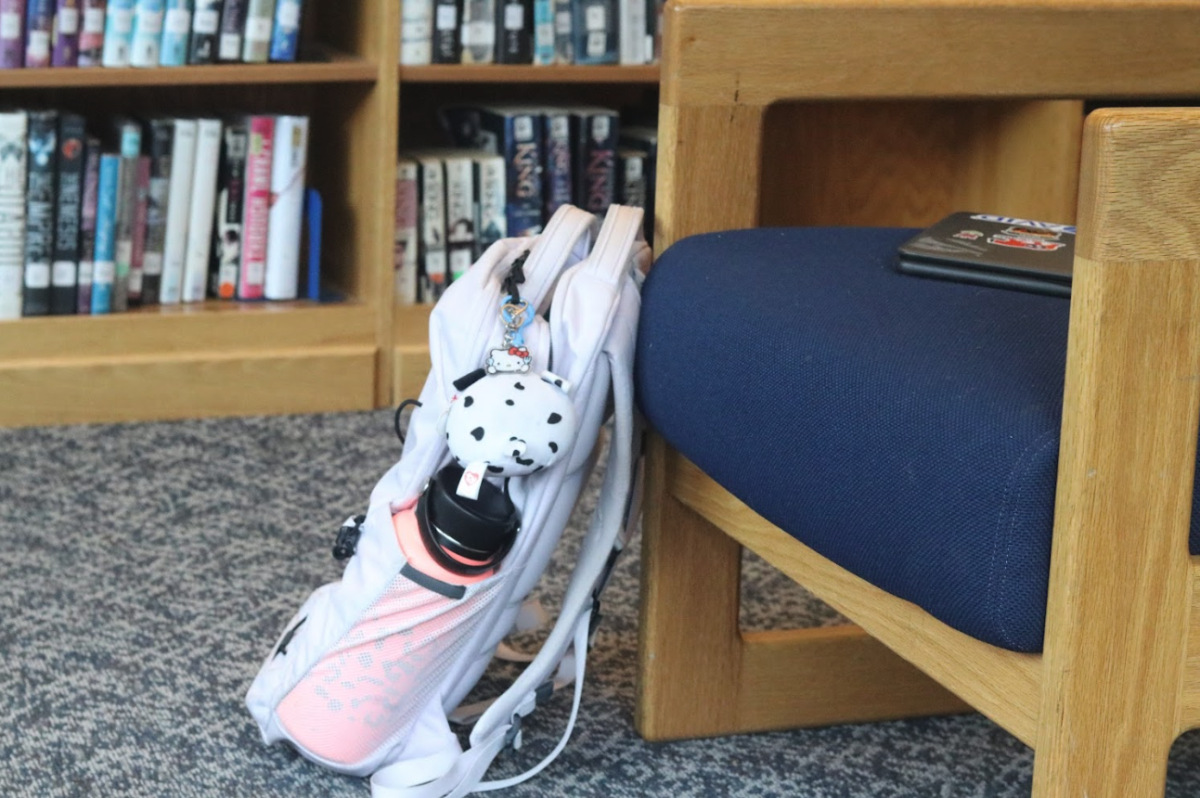 Student leaves chromebook on seat and bag by seat.